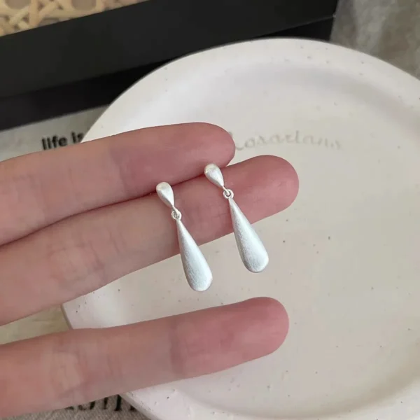 S925 Silver Korean Version Niche Design Ins Wind Brushed Water Drop Earrings Exquisite High-end Light Luxury