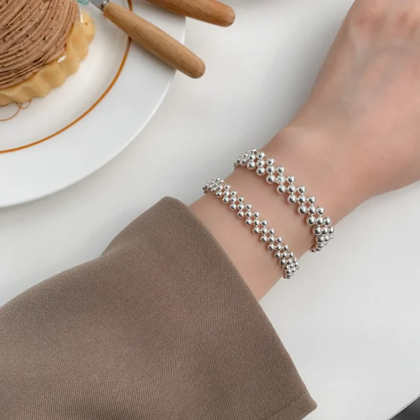 Light luxury middle-aged high-value hand-made silver bead bracelet ring S925 sterling silver lady elastic round bead bracelet