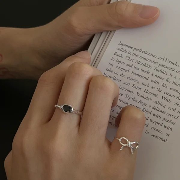 S925 sterling silver sweet cool black zircon ring women's open ring simple sweet temperament bow personalized tail ring