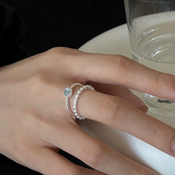 S925 sterling silver ring women's ice see-through aquamarine fine twist opening adjustable ring niche design index finger ring